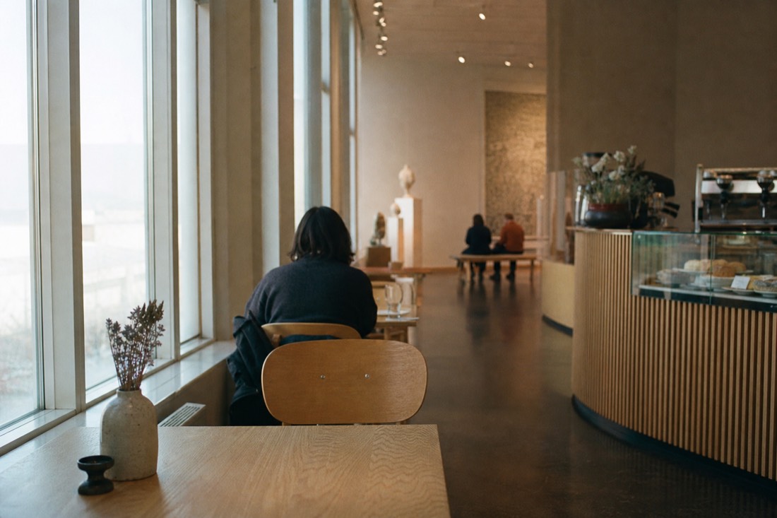 Louisiana Museum galleries and sculpture garden meeting the Oresund coast north of Copenhagen